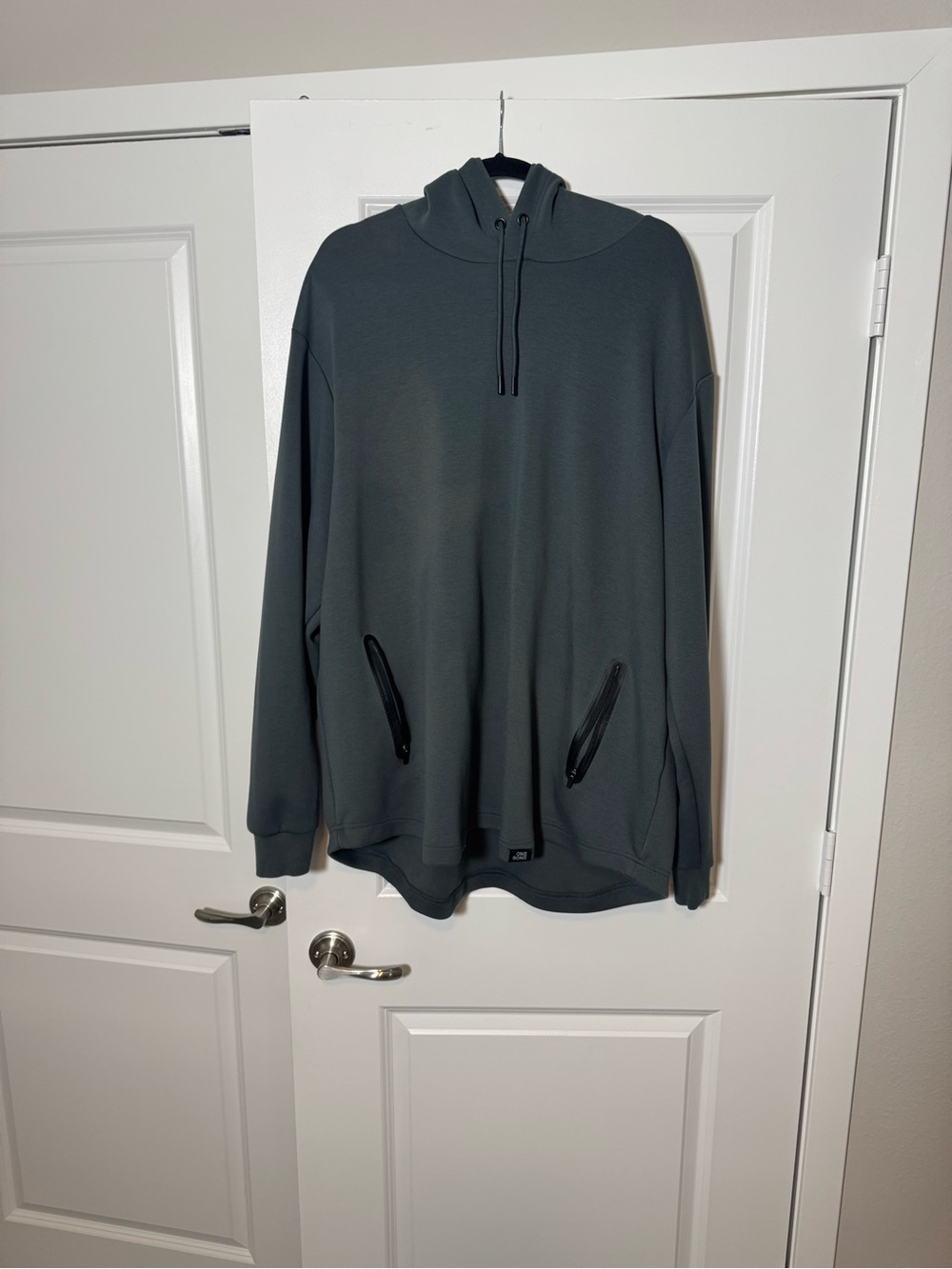 Dark Green Pullover Hoodie with Zip Pockets